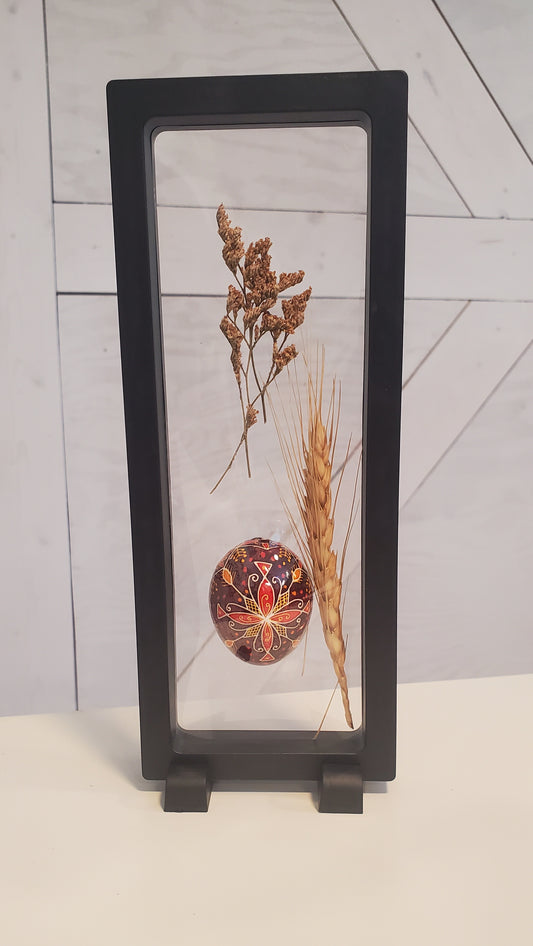 Pysanka in a frame