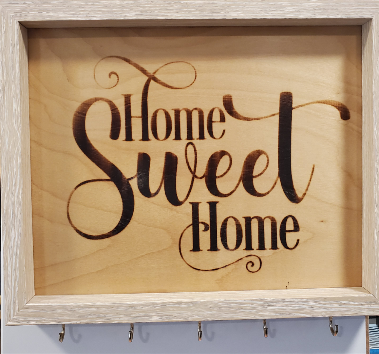 Picture the Art of burn key holder in frame A4
