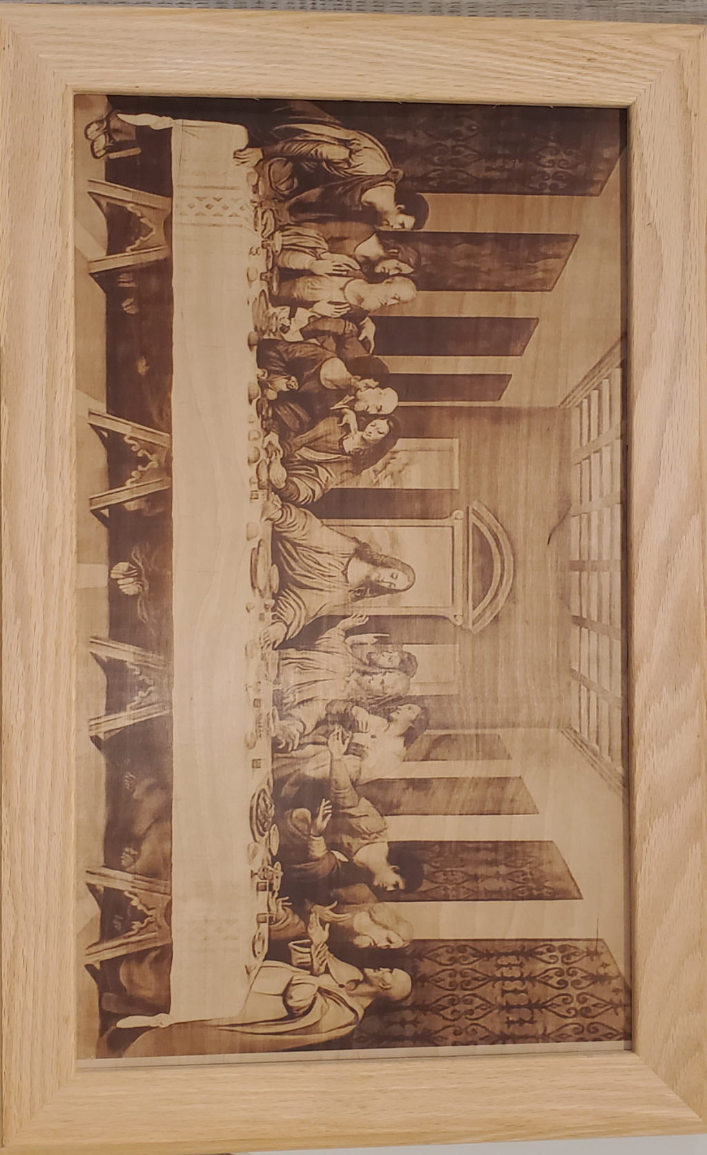 Picture the Art of burn in a red oak frame