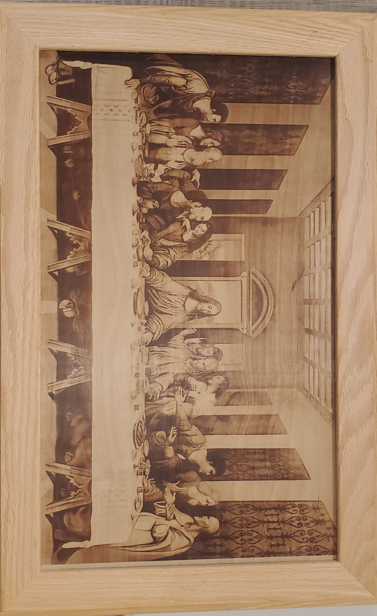 Picture the Art of burn in a red oak frame