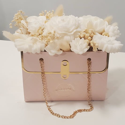 Candle bouquet of flowers in pink box