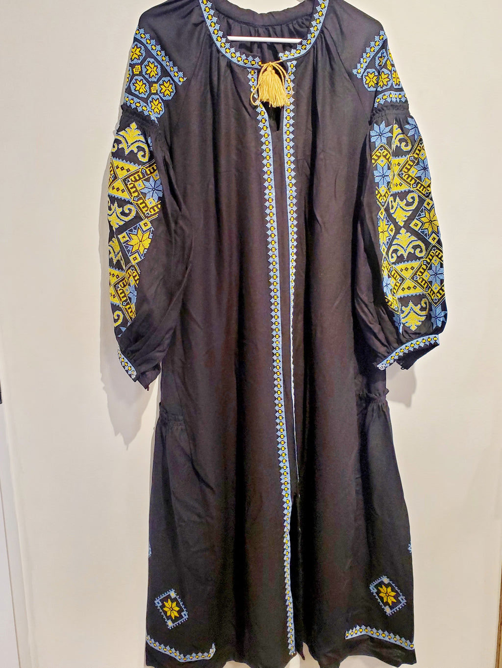 Embroidered women dress black with yellow-blue ornament