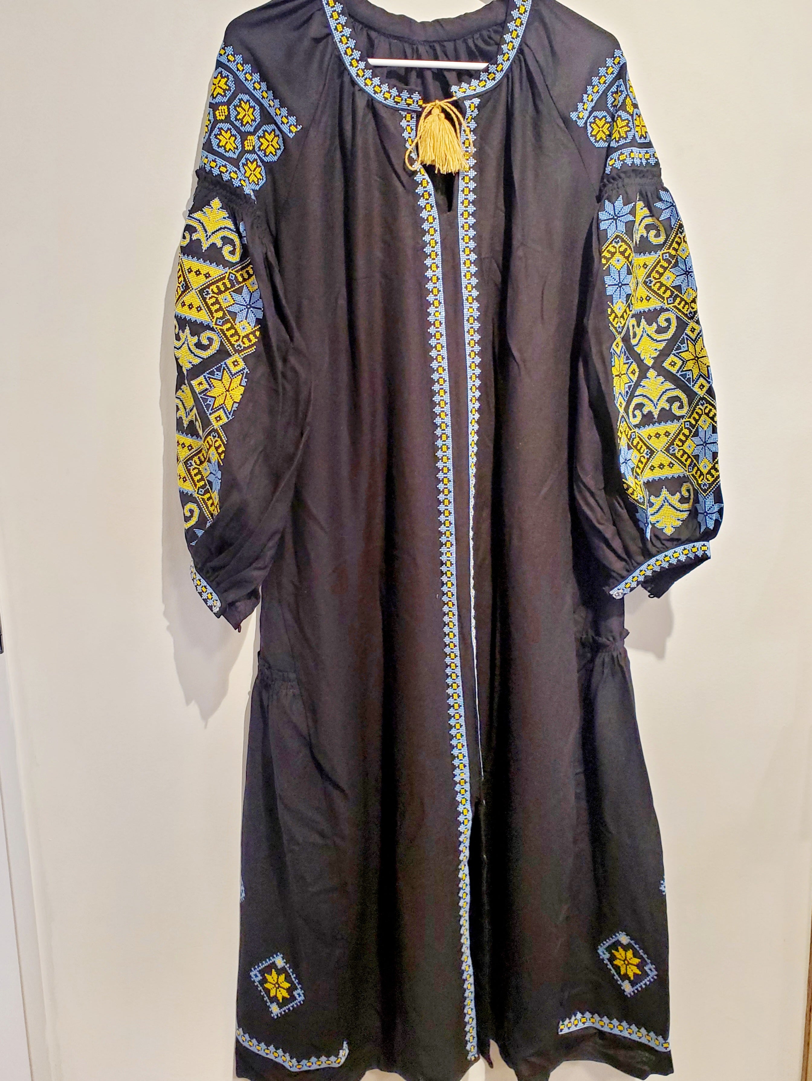 Embroidered women dress black with yellow-blue ornament