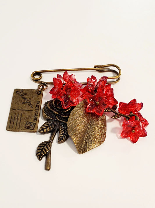 Brooch (glass, metal)