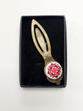 Bookmark with micro-embroidered name codes