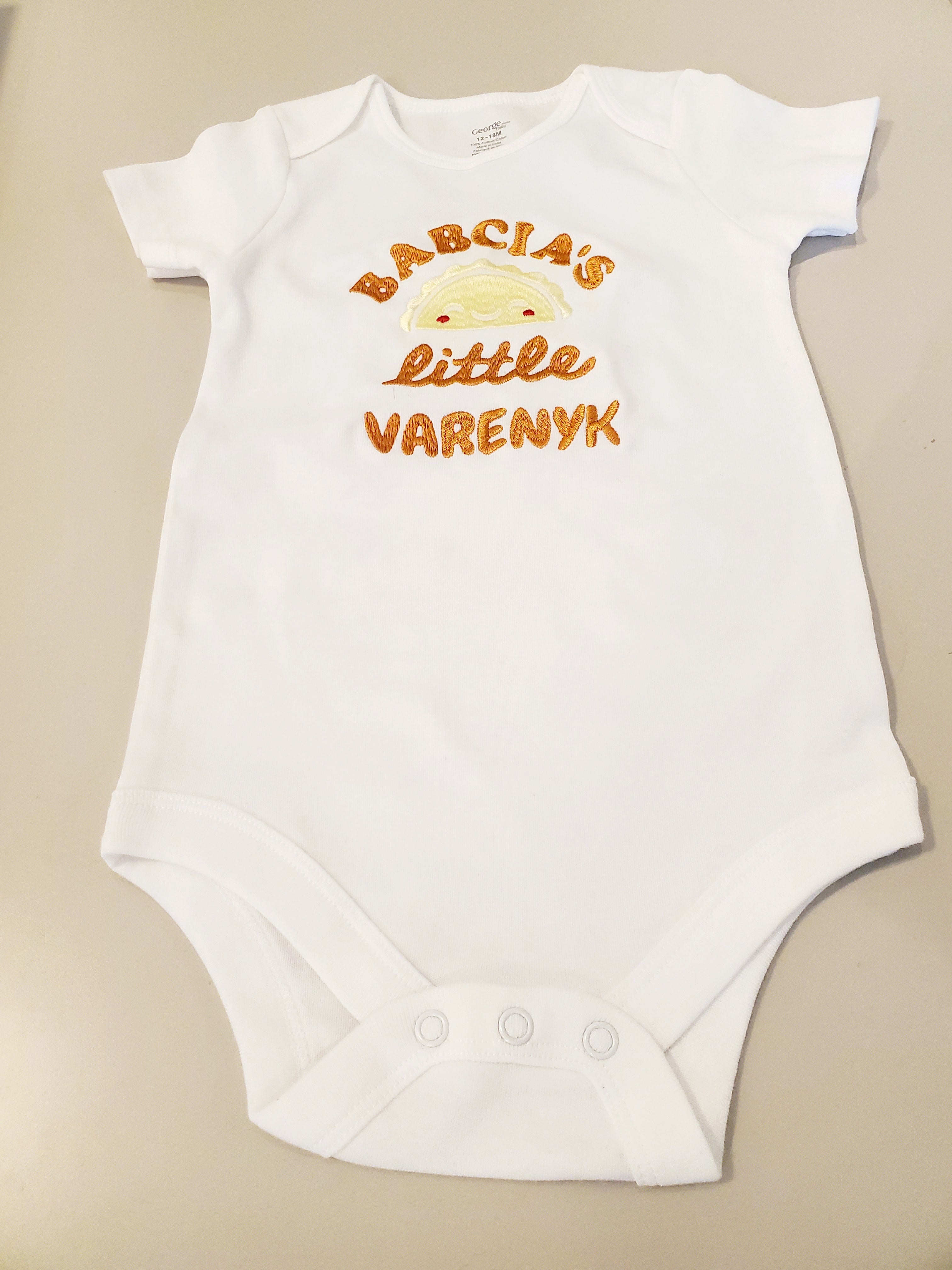 Baby bodysuit embroidered "Babcia's Little Varenyk"